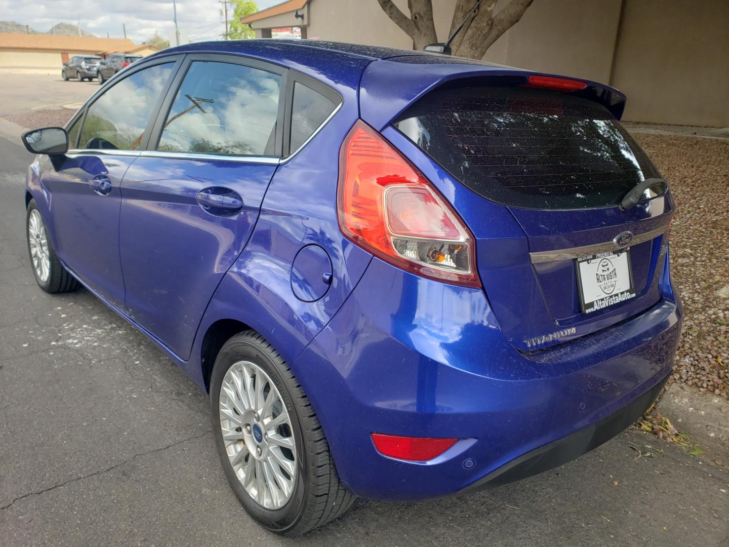 2014 /Tan and black Ford Fiesta Titanium (3FADP4FJ5EM) with an 1.6l i4 engine, 6-Speed Automatic transmission, located at 323 E Dunlap Ave., Phoenix, AZ, 85020, (602) 331-9000, 33.567677, -112.069000 - 2014 Ford Fiesta Titanium,.......A Must See!!... No accidents, Only 95K MILES.... Ice cold AC. The car is gorgeous inside and out. Power windows, Power door locks, Touch screen Stereo/ CD Player, Phone sync, Bluetooth, Satellite compatible, Backup camera, Beautiful tan and black interior with tan le - Photo#5